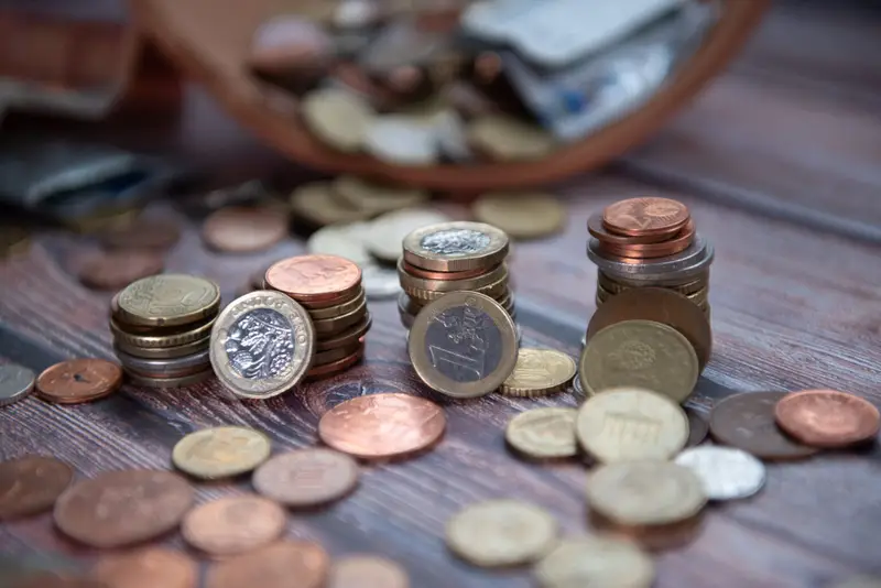 pile-of-coin-cash-money-stack-after-breaking-money-2023-11-27-05-27-18-utc-2048x1367-2-1536x1025